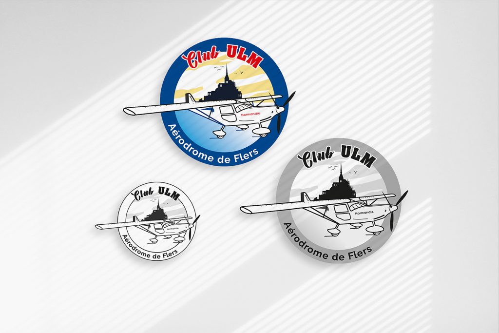 Image du logo écusson du club ulm de Flers en couleur et décliné en noir et blanc
